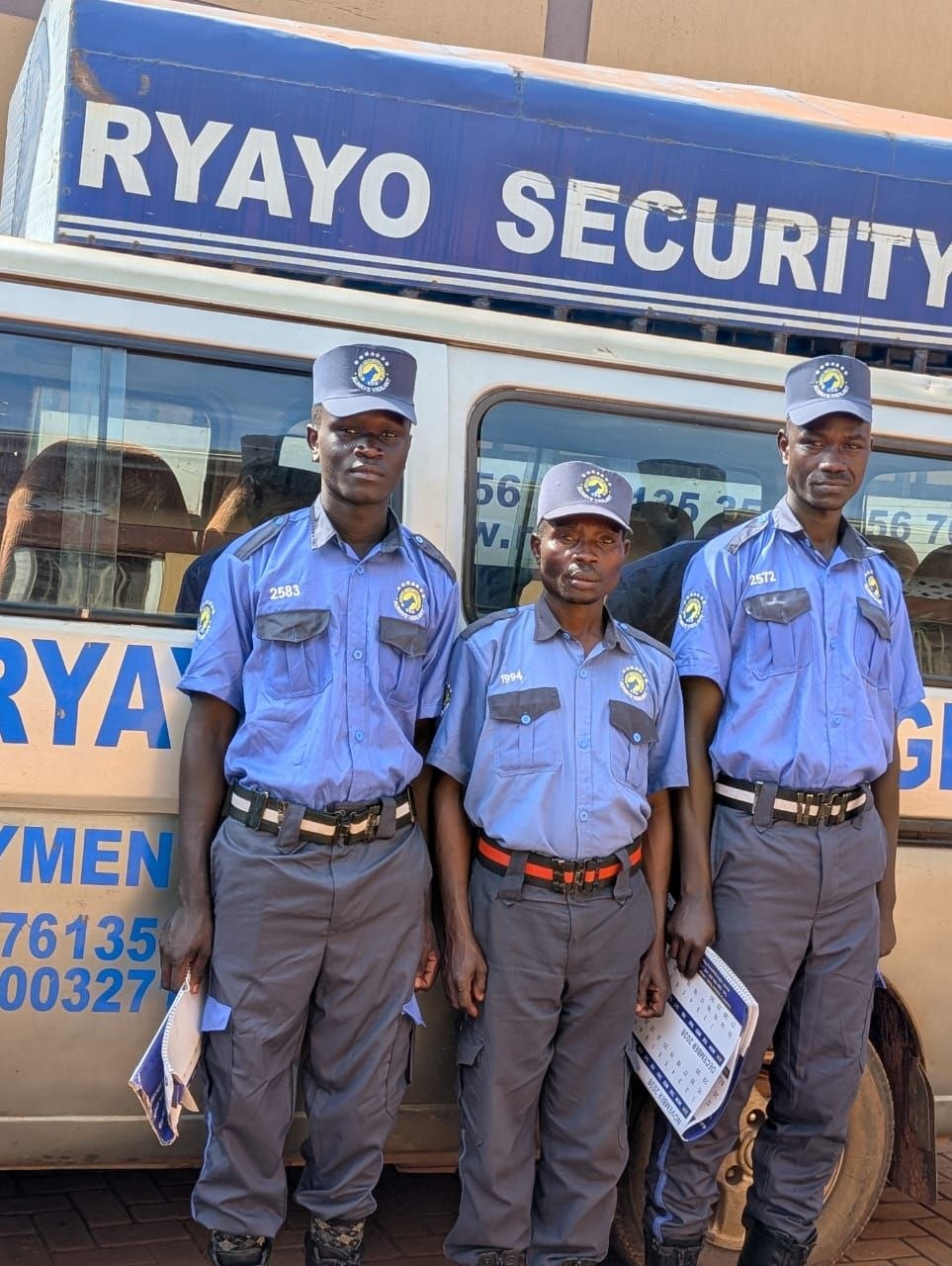 Officers with security vehicle
